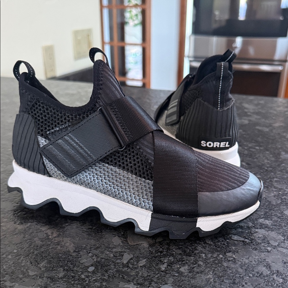 Sorel Black and White Kinetic Sneaker.